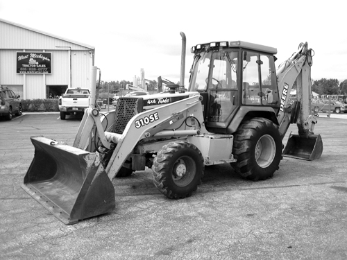 DEERE 310 SUPER E LOADER BACKHOE for sale in Holland, MI