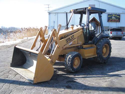 1998 CASE 570L-XT for sale in Holland, MI